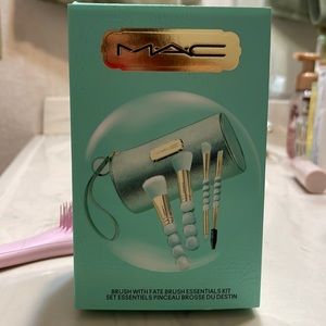 Mac brushes with fate
